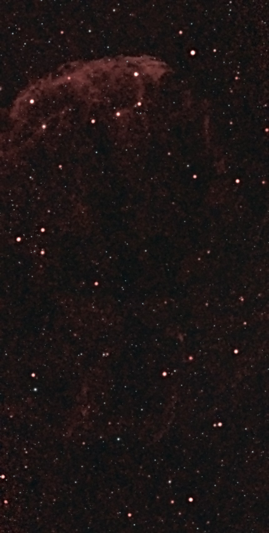 First 24 minutes on the Jellyfish Nebula (IC 443) from Lakeway, Texas with a ZWO Seestar S50 — the bright northeastern shock arc showing braided filament texture against a dense Gemini star field.