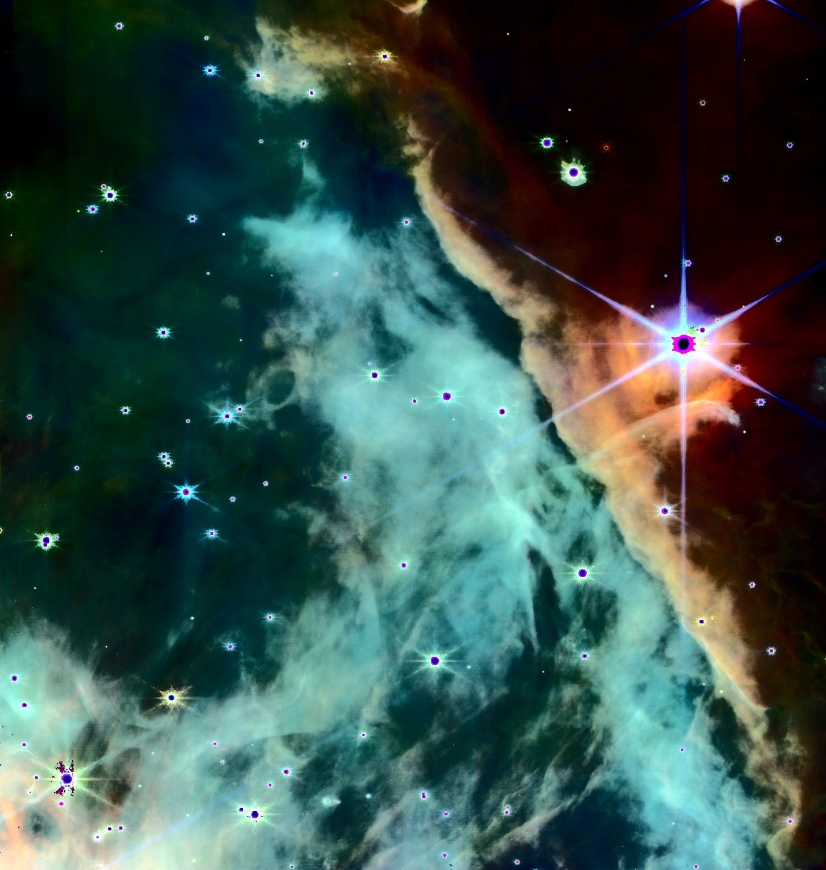 JWST's NIRCam zoom into the Orion Bar, reprocessed by Kyle Eberly — a diagonal gold dust ridge dividing teal ionized gas from a darker cloud, with a brilliant six-spiked star.
