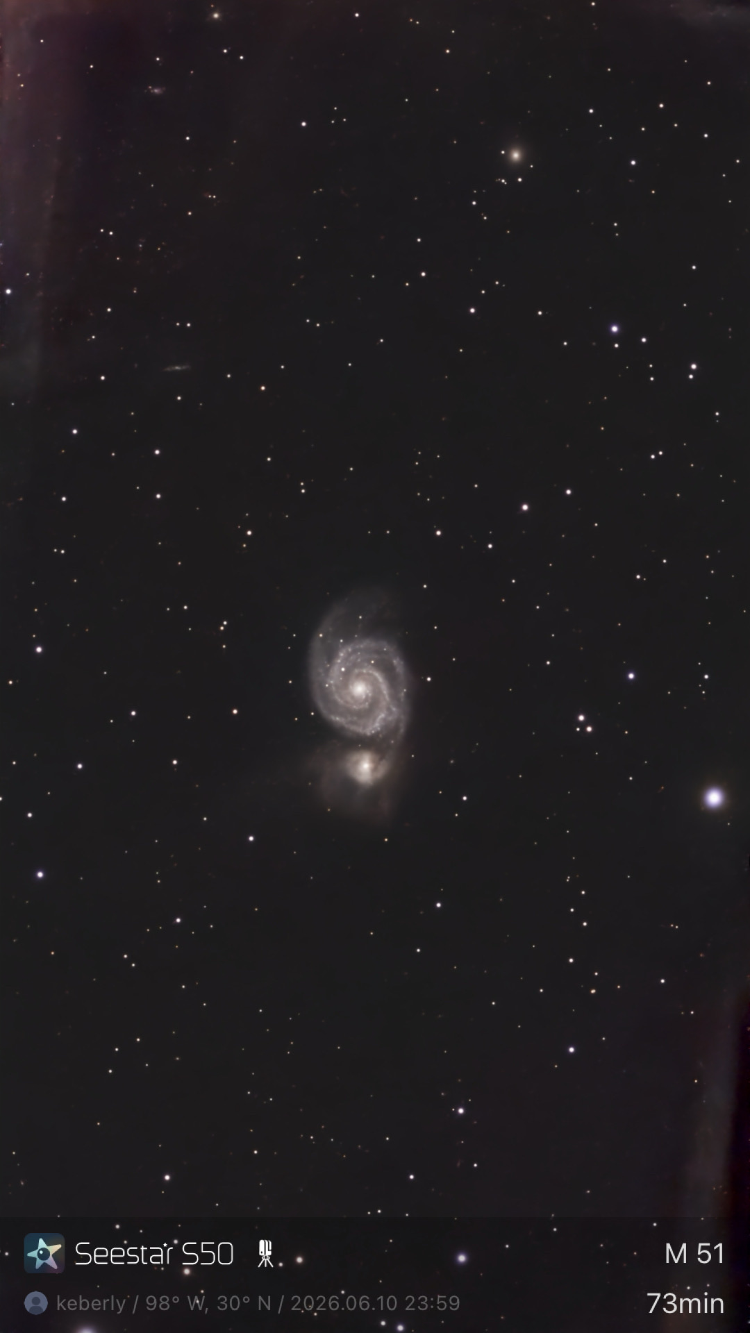 The Whirlpool Galaxy (M51) photographed from Lakeway, Texas with a ZWO Seestar S50 — a face-on spiral galaxy with its companion galaxy NGC 5195 attached below.