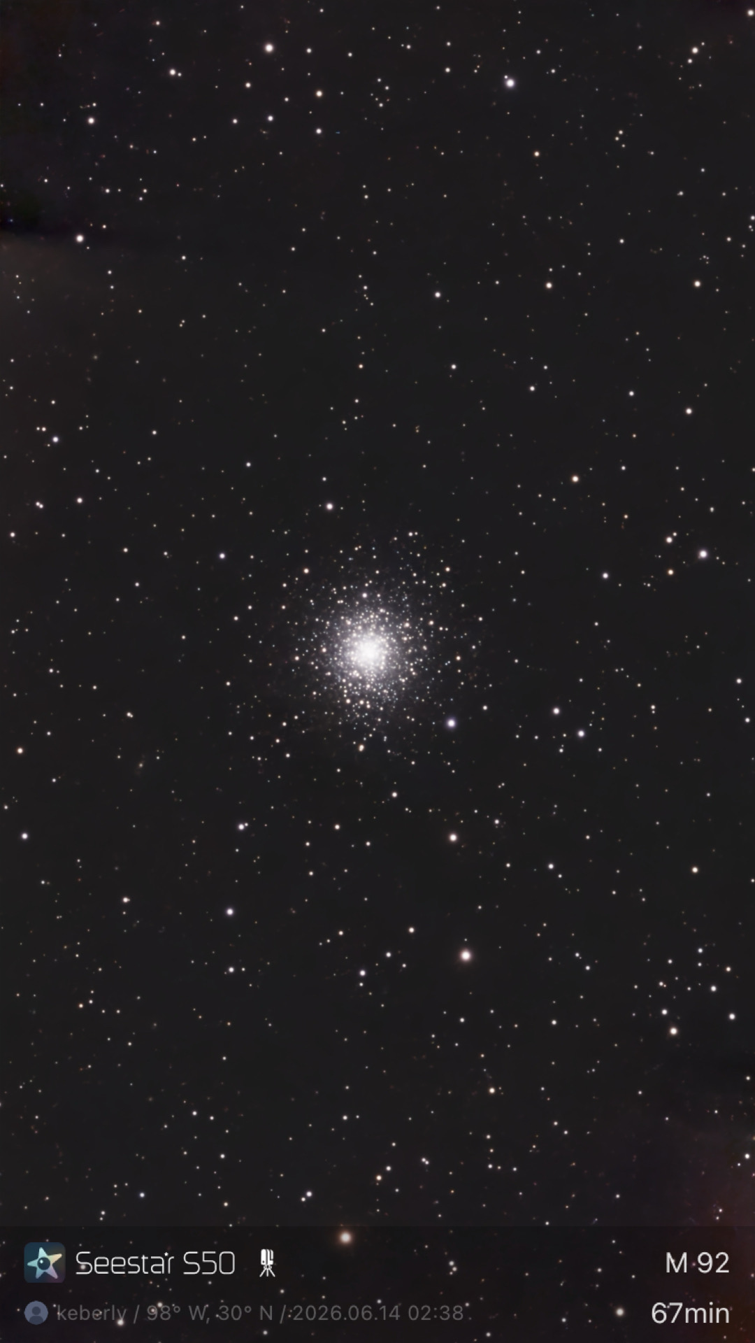 M92 photographed from Lakeway, Texas with a ZWO Seestar S50 — a dense, compact globular cluster of resolved stars with a bright concentrated core, set against a starfield in the constellation Hercules.