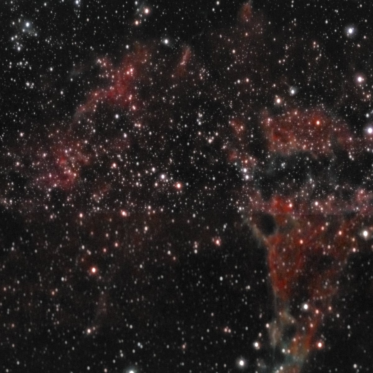 Pickering's Triangle region of the Veil Nebula photographed from Lakeway, Texas with a ZWO Seestar S50 — faint gray-blue wisps of supernova remnant against a dense star field.