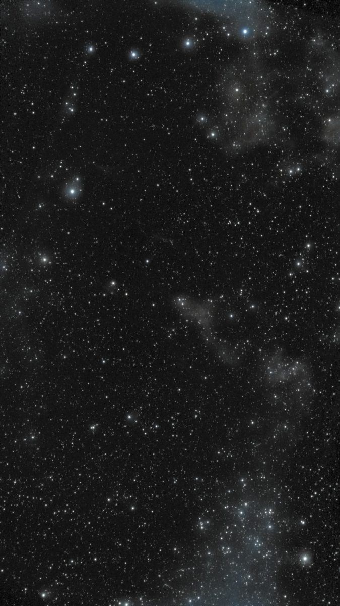 Pickering's Triangle region of the Veil Nebula photographed from Lakeway, Texas with a ZWO Seestar S50 — faint gray-blue wisps of supernova remnant against a dense star field.